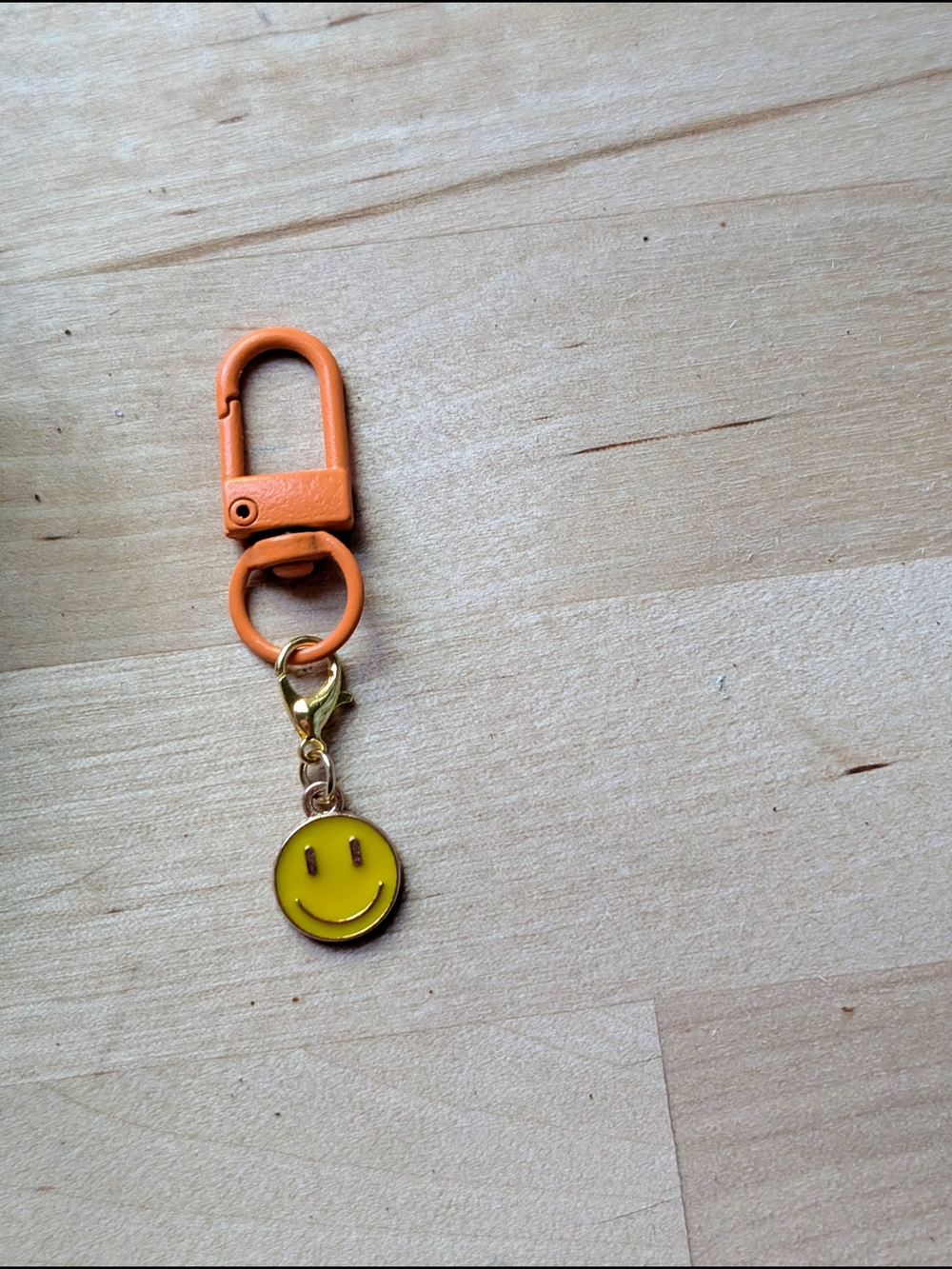 Orange Clip Keychain with Yellow Smiley Charm